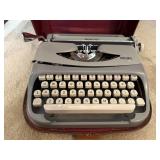 Royalite portable typewriter, carry case