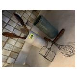 Skinny stoneware crocks (2), wooden spoons,
