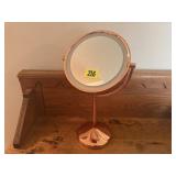 Battery operated lighted vanity magnifying mirror