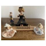 D-O-L-L-S scrabble tiles, toy dolls