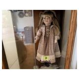 Porcelain doll with stand