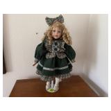 Porcelain doll with stand
