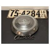 Lincense plate, Chevrolet hubcap, emblem