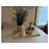 Cutting board, stoneware bowl, pestle, creamer,