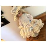 "Megan" porcelain doll with stand