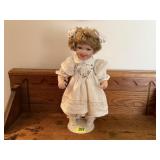 Porcelain doll, with stand