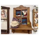 Holiday window shelf, plush Santa Claus