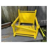 Yellow baby swing