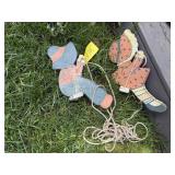 Swinging boy & girl garden art