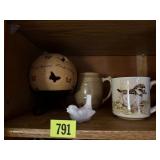 Butterfly tea light, pottery mugs, bird