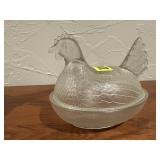 Glass hen on nest
