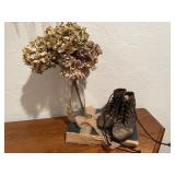 Upcycled book, shoes, bottle of dried florals