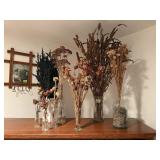 Vintage bottles of dried florals