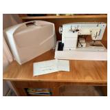 White sewing machine, carry case