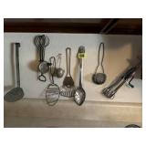 Vintage kitchen utensils, hand mixers, spoon