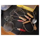 Vintage kitchen utensils, mashers, hand mixer