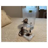 Glass vase, spring, doorknob, bird