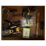 Contents of utility drawer, flashlights,