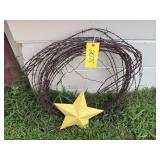 Barbed wire, yellow star