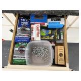 Contents of drawer, hardware, sanding block,