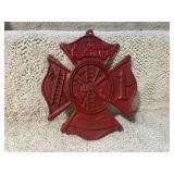 Cast iron Fireman sign