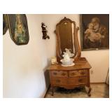 Serpentine dresser with attached mirror