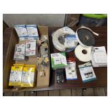 Box of electrical supplies, cable, digital timer,