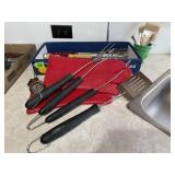 Grilling utensils, oven mitts, meat thermometer,
