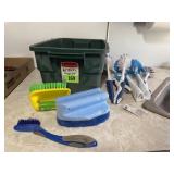 Tote of scrub brushes