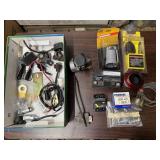 Box of automotive parts, gauges, battery, filter