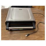 George Foreman grilling machine