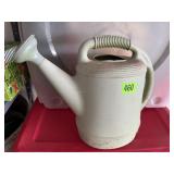 Plastic watering can