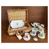 Picnic basket, toy tea set