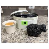 Cookie tin, votive candles, black sheep