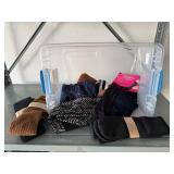 Storage tote of gripper, trouser, knee socks