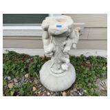 Concrete squirrel bird bath