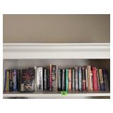Shelf of paperback books