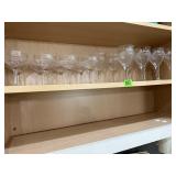 Shelf of etched stemware