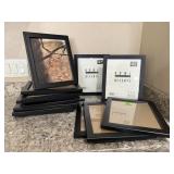 Assorted black picture frames (13)