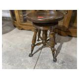 Antique clawfoot piano stool