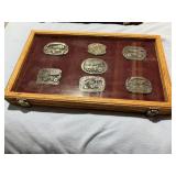 Display case, Steve Kinser belt buckles (6)