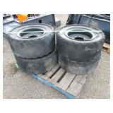 Set of 4 solid filled skid steer tires-rims 8 bolt