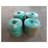 four balls of plastic twine