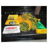 packer towels, pom poms, hat