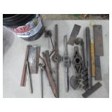 thread cutters, auger, iron in bucket