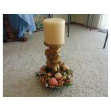 large candle and holder