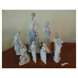 figurines, one broken as shown