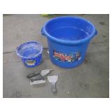 2 blue buckets and masonry hand tools