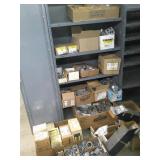 shelf of metal box extenders, covers, connectors