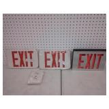 three EXIT signs